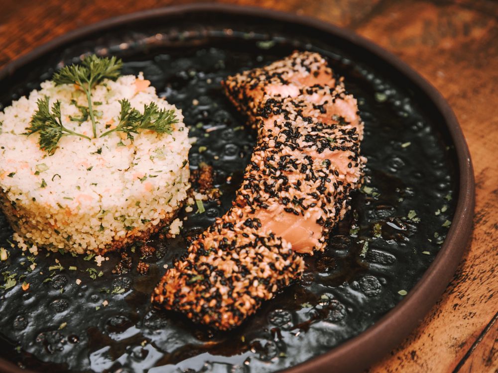 Couscous served in a copper dish at the Courtyard Table