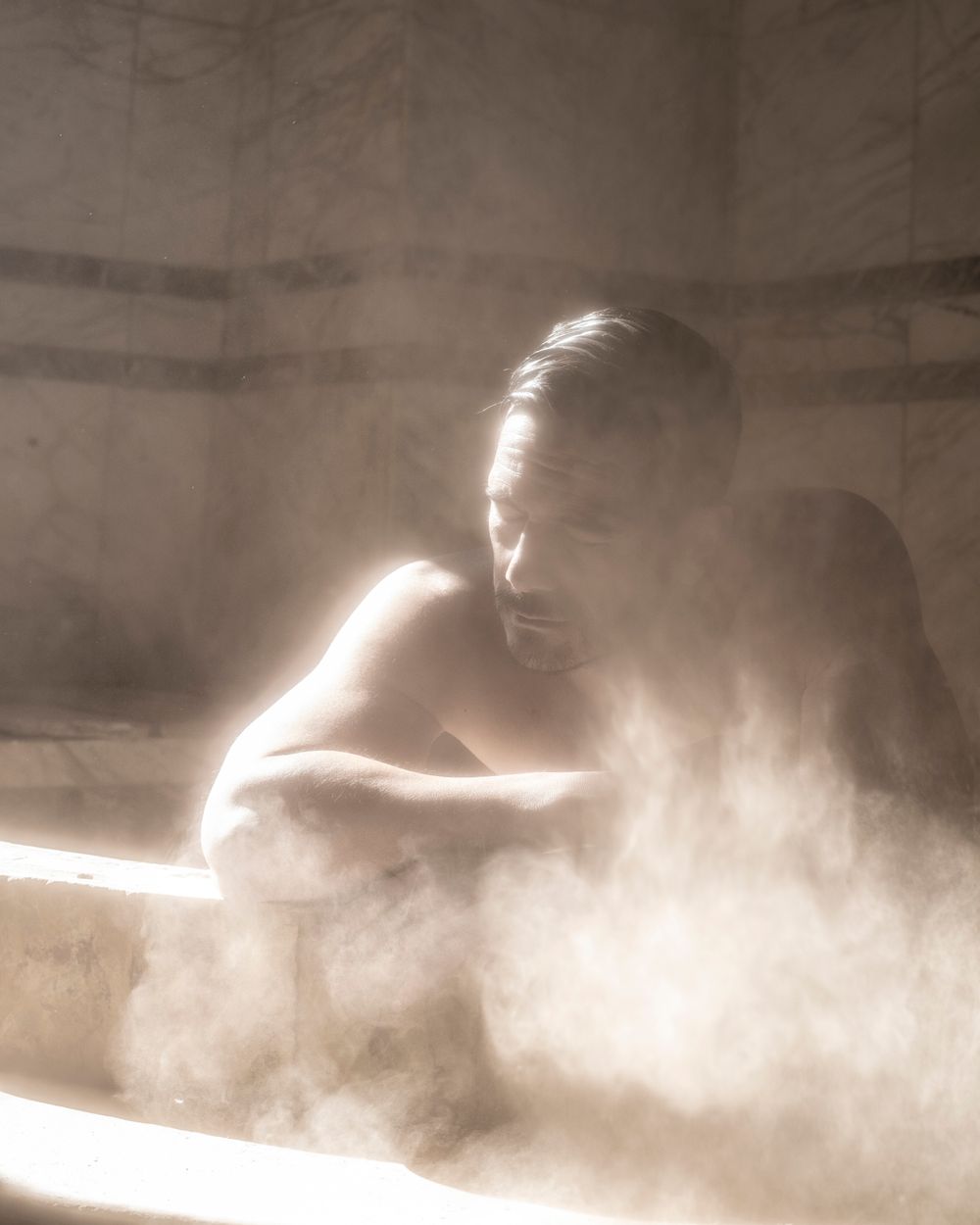 The tiled hammam with soft steam